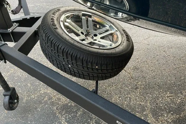Slide: The Image of Spare tire mounted on a Ranger ALPHA 208 trailer, 2025 model. - 12
