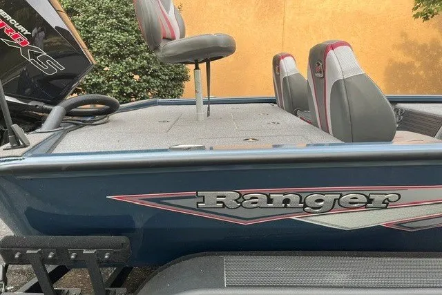 Slide: The Image of 2025 Ranger ALPHA 208 boat with seating and branding details. - 6