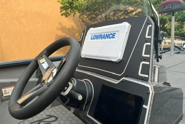 Slide: The Image of 2025 Ranger ALPHA 208 boat dashboard with Lowrance navigation system. - 9