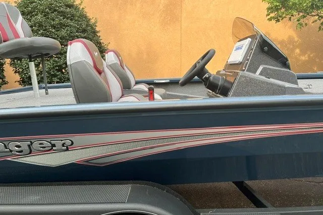 Slide: The Image of 2025 Ranger ALPHA 208 boat with sleek design and comfortable seating. - 5