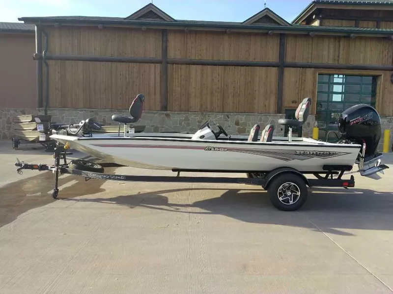 Slide: The Image of 2025 Ranger RT198P fishing boat on trailer, parked outdoors. - 0