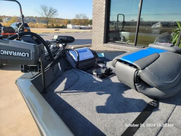 Slide: The Image of 2025 Ranger RT198P boat deck with Lowrance equipment, photographed outdoors. - 11