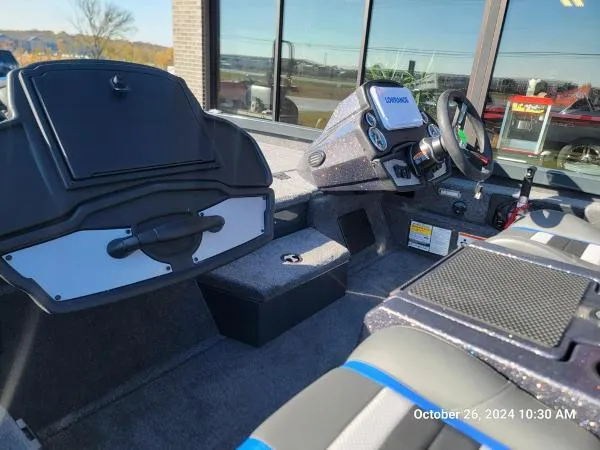 Slide: The Image of 2025 Ranger RT198P boat interior with modern dashboard and seating, photographed on October 26, 2024. - 12