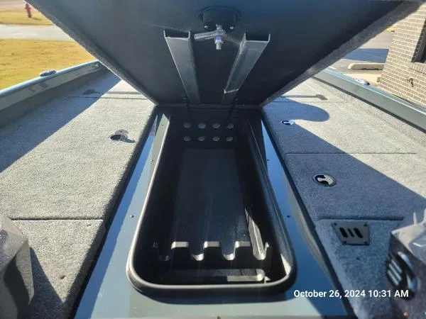 Slide: The Image of Open storage compartment on 2025 Ranger RT198P boat deck. - 7