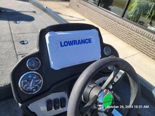 Slide: The Image of Dashboard of a 2025 Ranger RT198P boat with Lowrance display and gauges. - 8