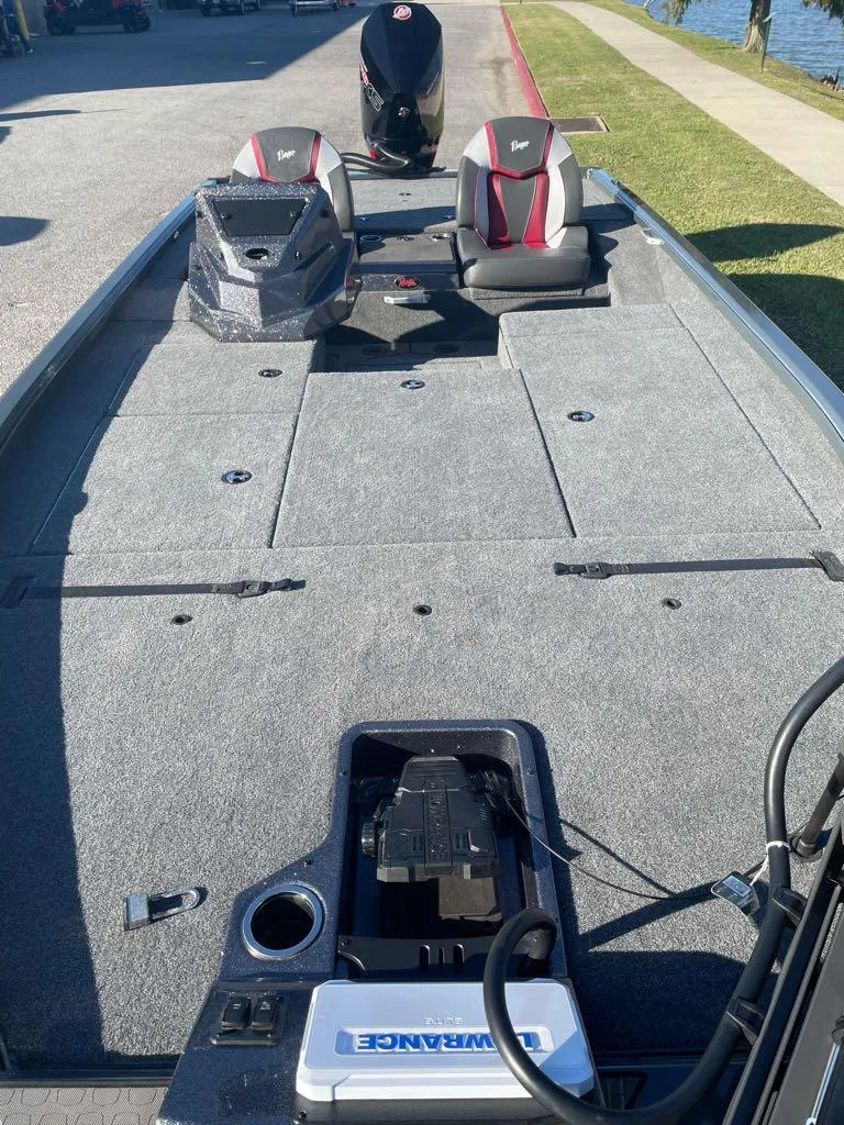 Slide: The Image of 2025 Ranger ALPHA 208 boat with spacious deck and dual seating. - 3