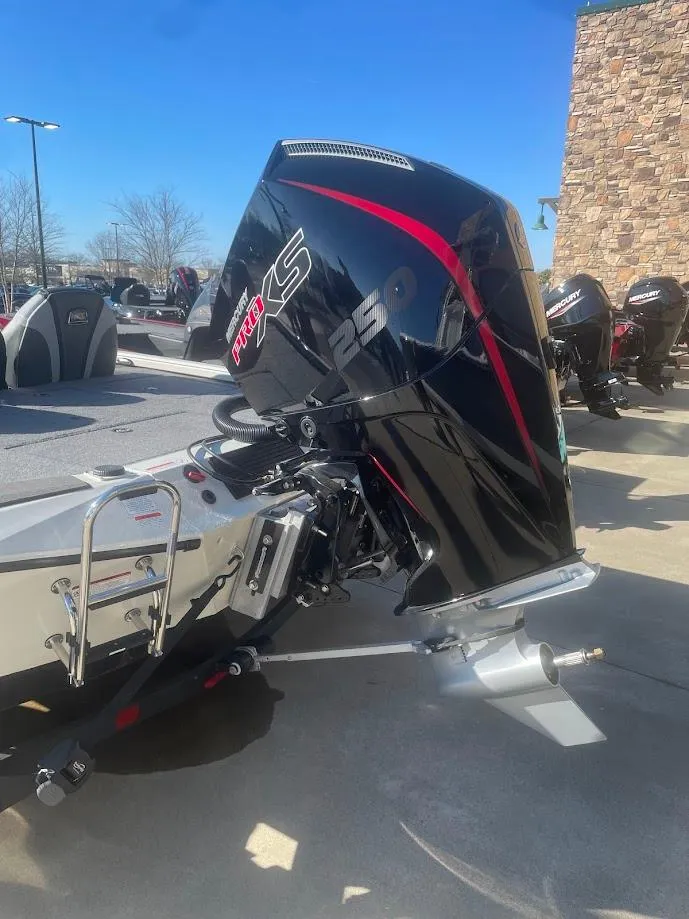 Slide: The Image of Ranger ALPHA 208 boat engine, 2025 model, displayed outdoors on a sunny day. - 3