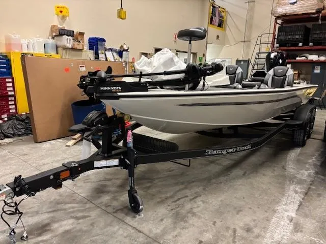 Slide: The Image of 2025 Ranger ALPHA 208 boat on trailer in a storage facility. - 1