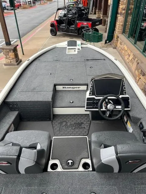 Slide: The Image of 2025 Ranger ALPHA 208 boat interior with modern dashboard and seating. - 5