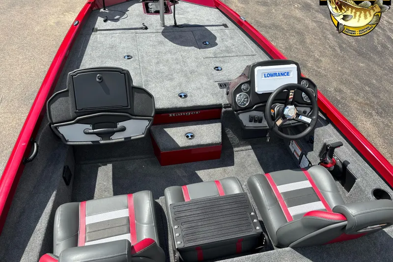Slide: The Image of 2025 Ranger RT188P boat interior with steering wheel, Lowrance display, and dual seats. - 4