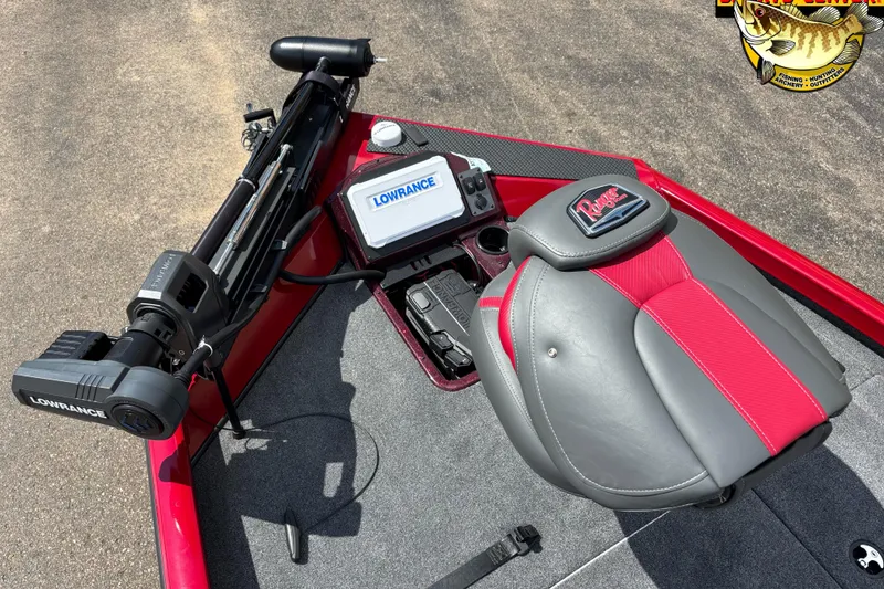 Slide: The Image of 2025 Ranger RT188P boat interior with Lowrance equipment and red-gray seating. - 7