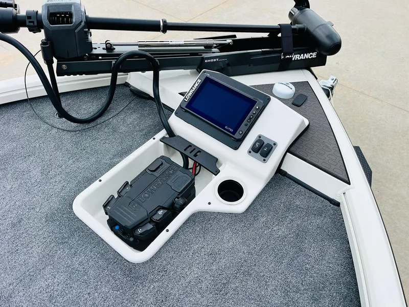 Slide: The Image of 2025 Ranger ALPHA 208 boat dashboard with navigation system and control panel. - 12