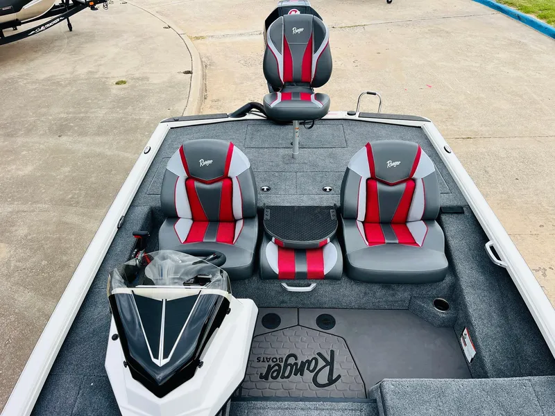 Slide: The Image of 2025 Ranger ALPHA 208 boat interior with red and gray seating. - 26
