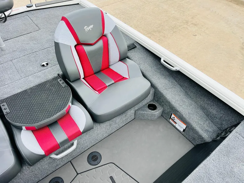 Slide: The Image of 2025 Ranger ALPHA 208 boat interior with gray and red seating. - 27