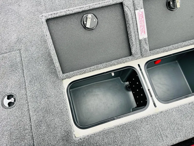 Slide: The Image of Ranger ALPHA 208 boat storage compartments, 2025 model, featuring secure latches and spacious design. - 38