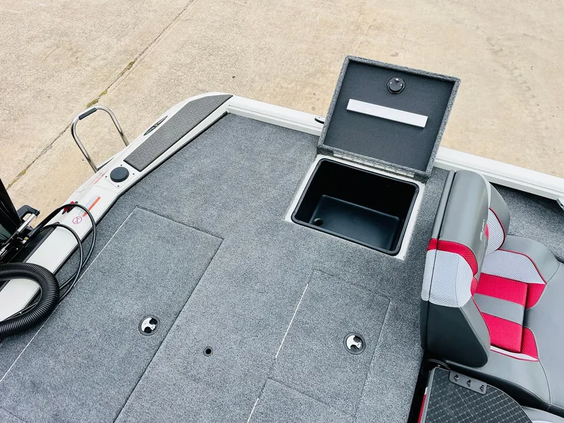Slide: The Image of 2025 Ranger ALPHA 208 boat deck with storage compartment and seating. - 41