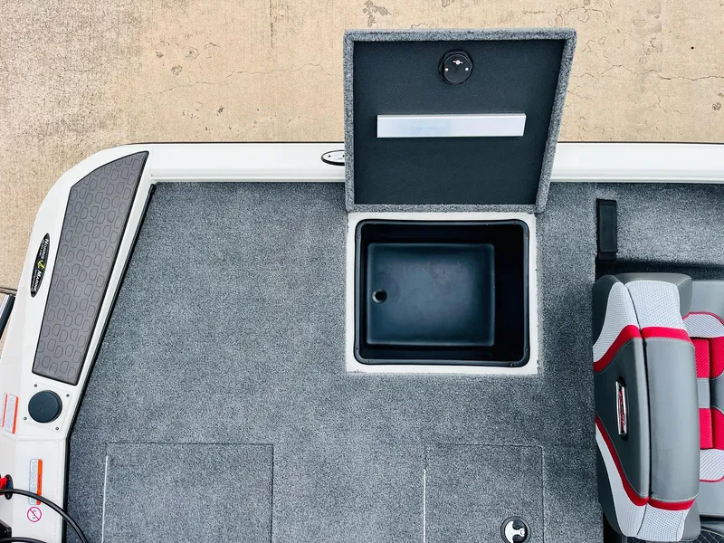Slide: The Image of Ranger ALPHA 208 boat interior, open storage compartment, gray carpet, 2025 model. - 42