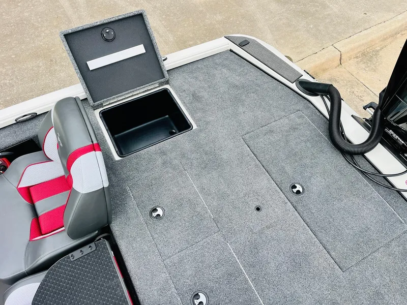 Slide: The Image of 2025 Ranger ALPHA 208 boat deck with storage compartment and seating. - 44