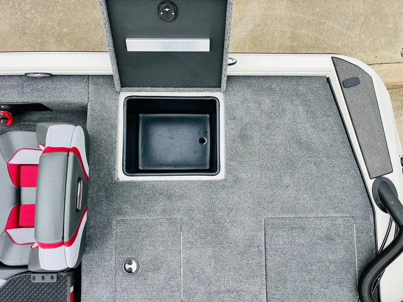 Slide: The Image of Ranger ALPHA 208 2025 boat interior with open storage compartment and seating. - 45
