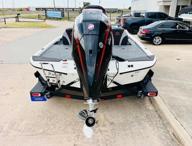 Slide: The Image of 2025 Ranger ALPHA 208 boat on trailer, rear view, parked outdoors. - 5