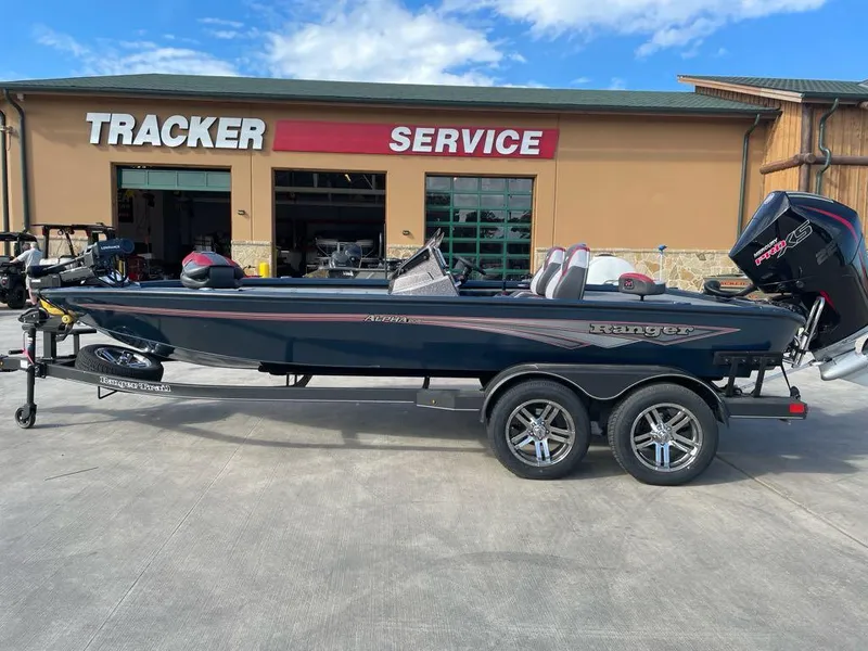 Slide: The Image of 2025 Ranger ALPHA 208 boat at Tracker service center, side view. - 0