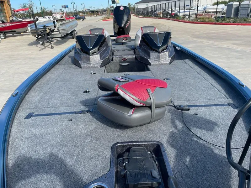 Slide: The Image of 2025 Ranger ALPHA 208 boat interior with seating and storage compartments. - 3
