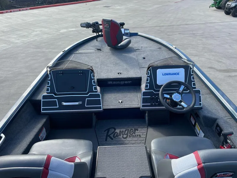 Slide: The Image of 2025 Ranger ALPHA 208 boat interior with dual consoles and Lowrance electronics. - 5
