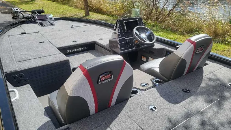 Slide: The Image of 2025 Ranger ALPHA 208 boat interior with dual seats and steering console. - 4