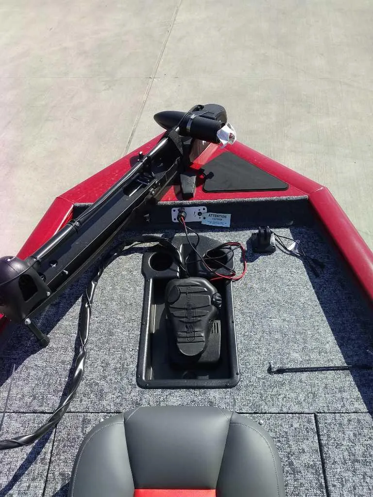 Slide: The Image of 2025 Tracker Pro Team 175 boat deck with trolling motor and seating. - 6