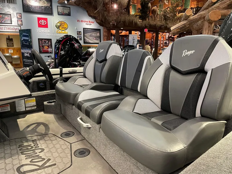 Slide: The Image of Ranger ALPHA 208 boat interior with sleek gray seating, 2025 model. - 3