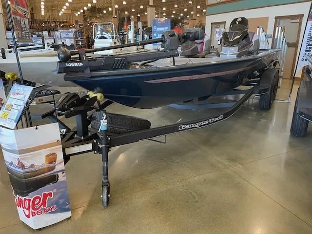Slide: The Image of 2025 Ranger ALPHA 208 boat rear view with motor and trailer. - 3