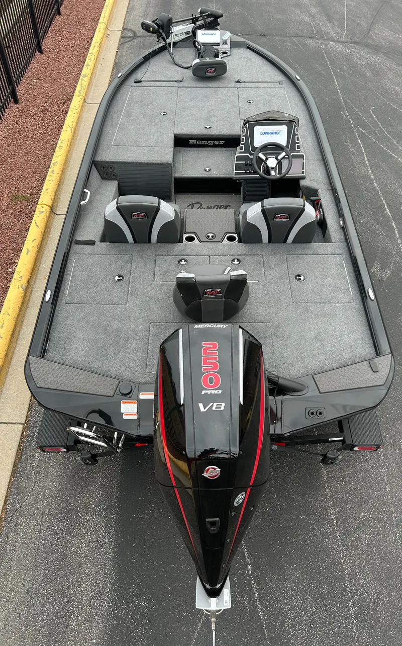 Slide: The Image of 2025 Ranger ALPHA 208 boat, top view, featuring sleek design and advanced navigation system. - 2