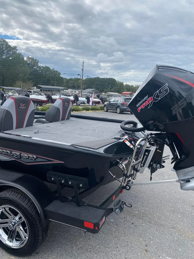 Slide: The Image of 2025 Ranger ALPHA 208 boat with powerful engine, sleek design, and comfortable seating. - 8