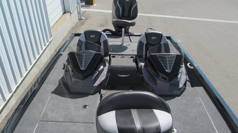 Slide: The Image of 2025 Ranger ALPHA 208 boat interior with three seats and sleek design. - 12