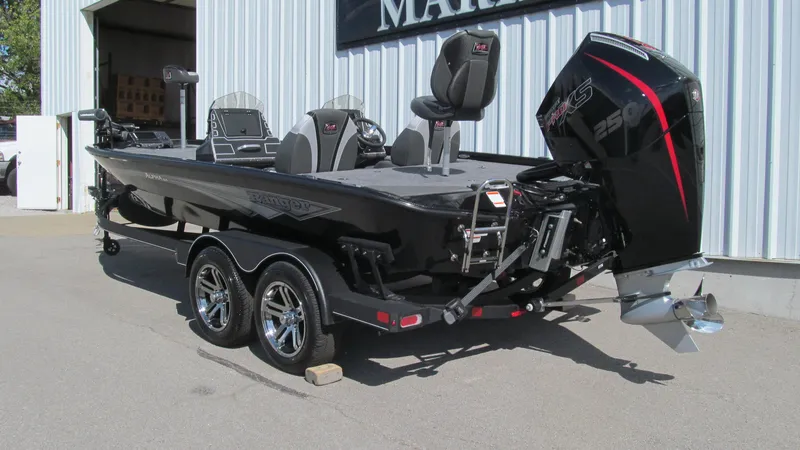 Slide: The Image of 2025 Ranger ALPHA 208 boat with powerful outboard motor on trailer. - 3