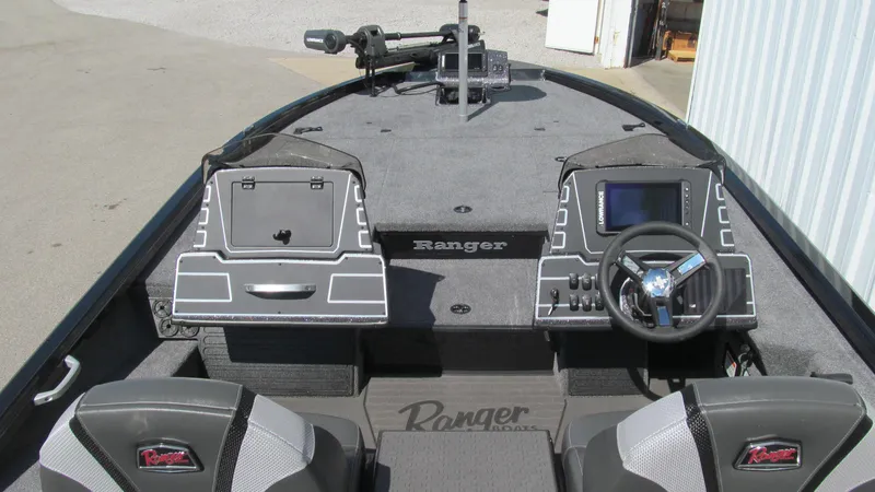 Slide: The Image of 2025 Ranger ALPHA 208 boat interior with steering console and seating. - 5