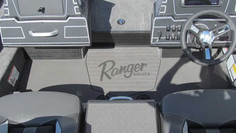 Slide: The Image of 2025 Ranger ALPHA 208 boat interior with steering wheel and dashboard controls. - 8