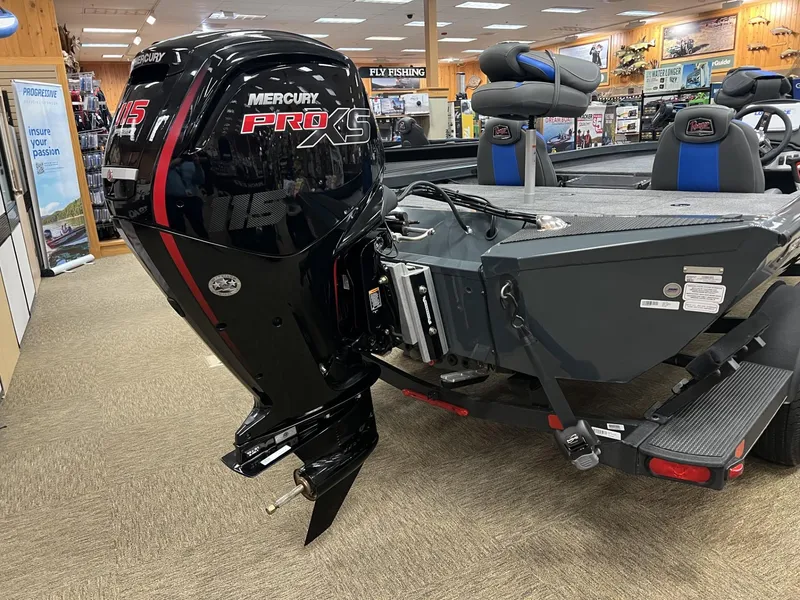 Slide: The Image of 2025 Ranger RT188P boat with Mercury Pro XS outboard motor in showroom. - 3