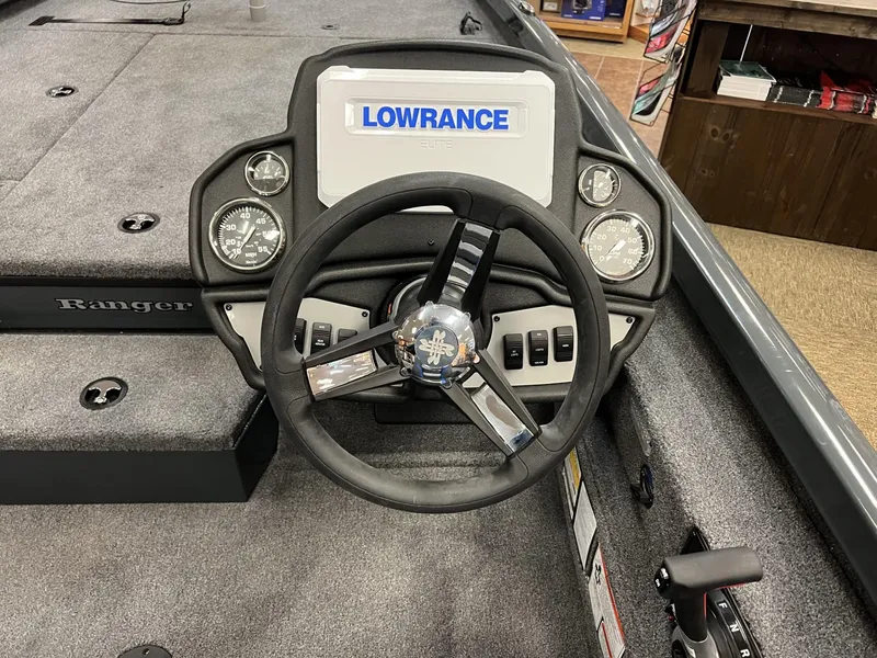 Slide: The Image of 2025 Ranger RT188P boat dashboard with Lowrance GPS and steering wheel. - 5