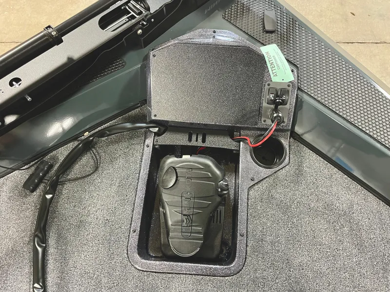 Slide: The Image of 2025 Ranger RT188P boat interior with electronic wiring and storage compartment. - 10