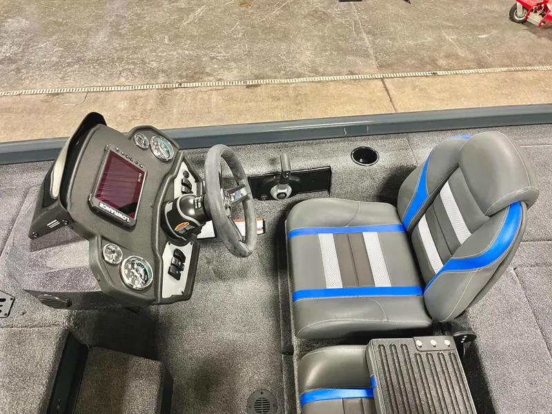Slide: The Image of 2025 Ranger RT188P boat interior with modern dashboard and dual-tone seating. - 12
