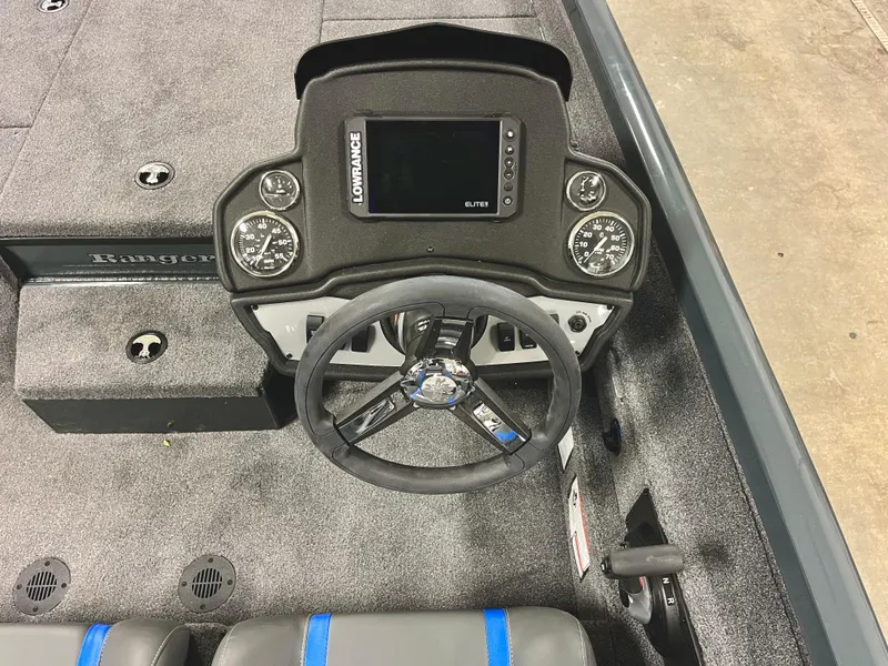 Slide: The Image of 2025 Ranger RT188P boat dashboard with steering wheel and electronic display. - 14