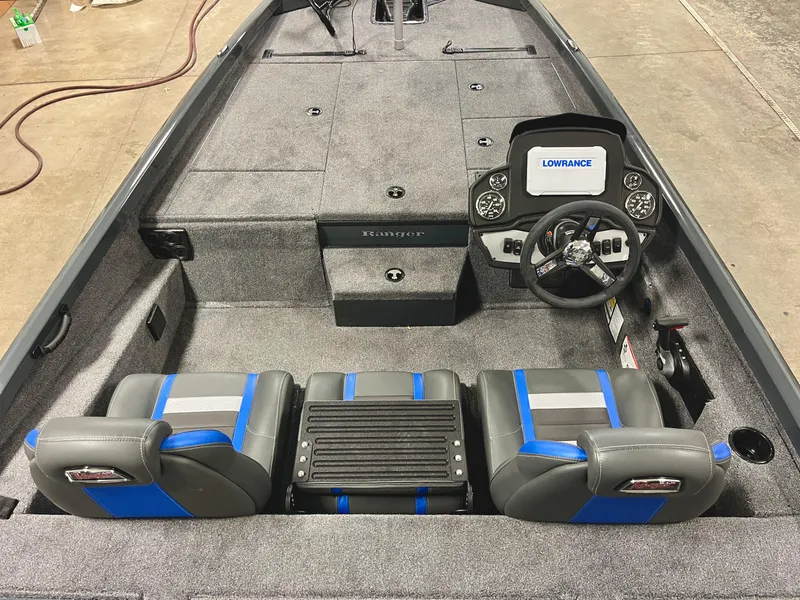Slide: The Image of 2025 Ranger RT188P boat interior with Lowrance electronics and dual seats. - 8