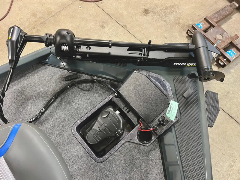 Slide: The Image of 2025 Ranger RT188P boat with Minn Kota trolling motor on deck. - 9