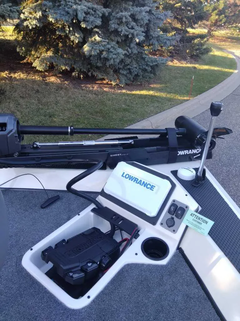 Slide: The Image of 2025 Ranger RT198P boat with Lowrance electronics and trolling motor. - 6