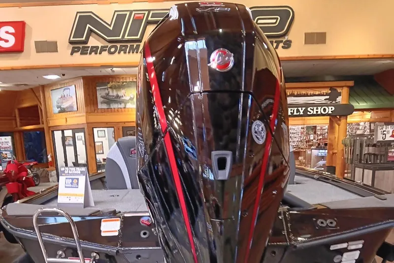 Slide: The Image of Ranger ALPHA 208 boat engine, 2025 model, displayed in a showroom. - 3