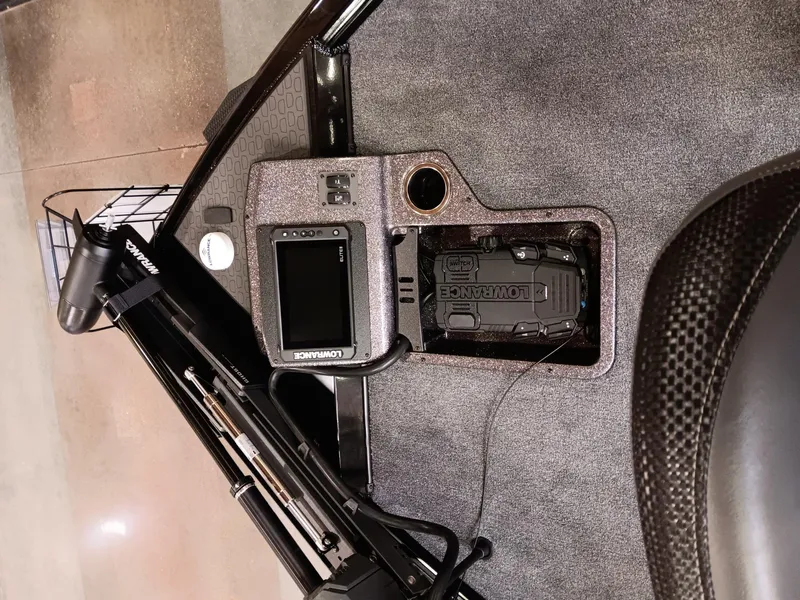 Slide: The Image of 2025 Ranger ALPHA 208 boat dashboard with Lowrance electronics and control panel. - 5