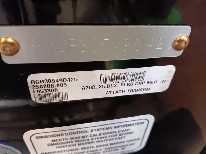 Slide: The Image of Close-up of Ranger ALPHA 208 2025 model identification and emissions control labels. - 8