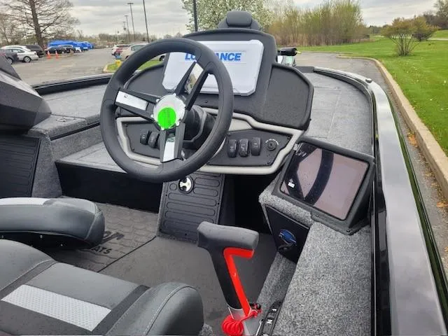 Slide: The Image of 2025 Ranger ALPHA 208 boat cockpit with steering wheel and control panel. - 4