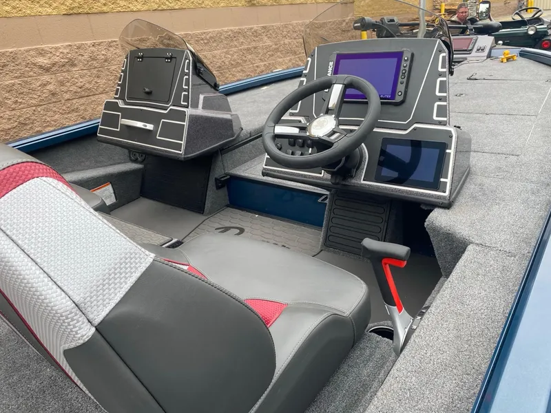 Slide: The Image of 2025 Ranger ALPHA 208 boat interior with modern dashboard and steering wheel. - 4